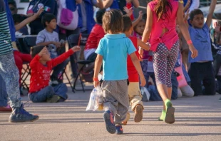 Members of the migrant caravan take temporary shelter in a stadium in Mexico City on their way to the United States border, Nov. 8, 2018. David Ramos/CNA